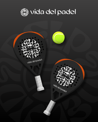Two black and orange paddle tennis rackets with a green ball on a dark background, featuring 'vida del padel' branding.